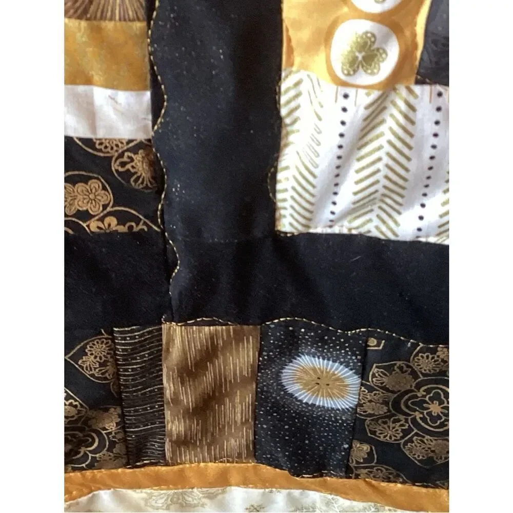 NWT. Gold and Black Star Lap Quilt
